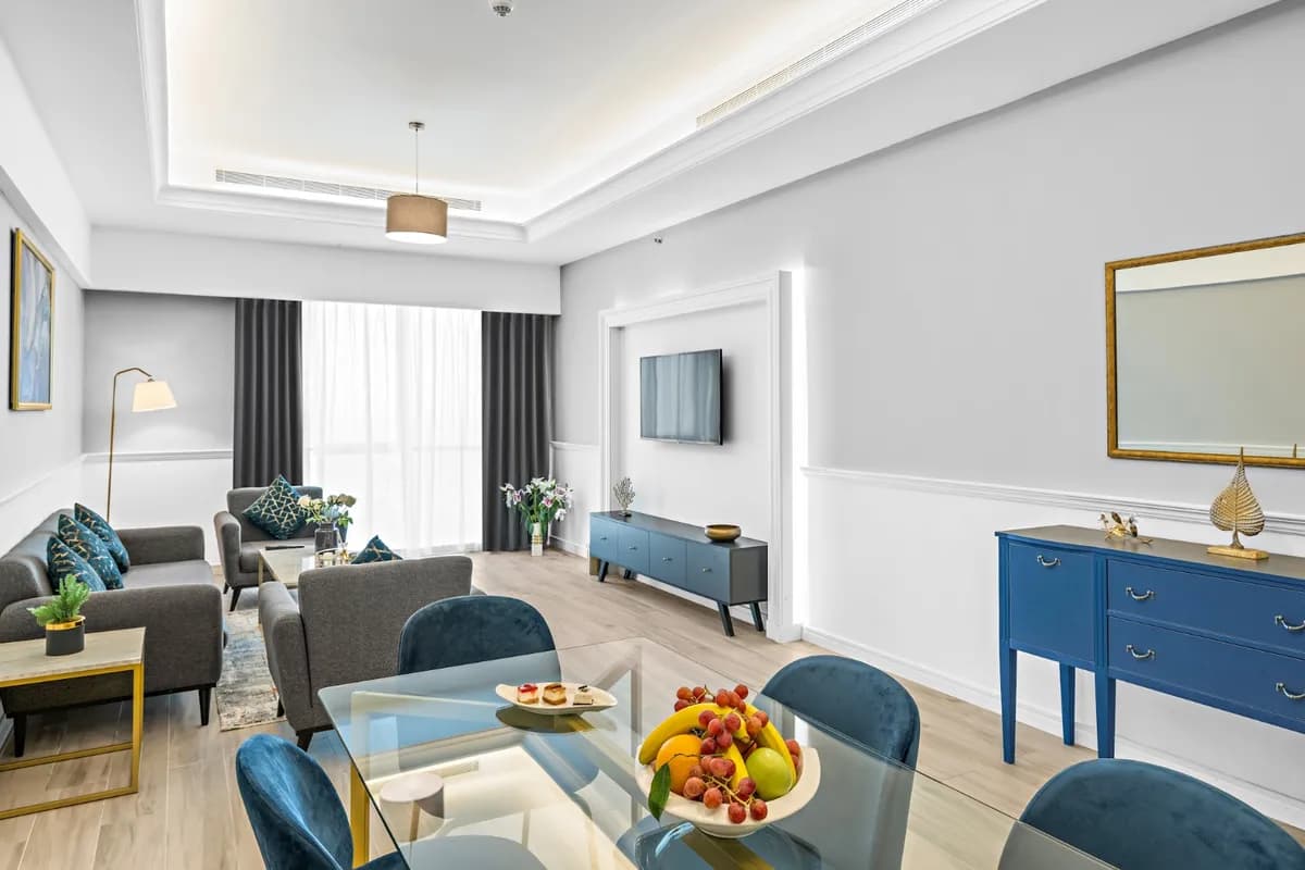 A living and dining room in the Rotana Residences