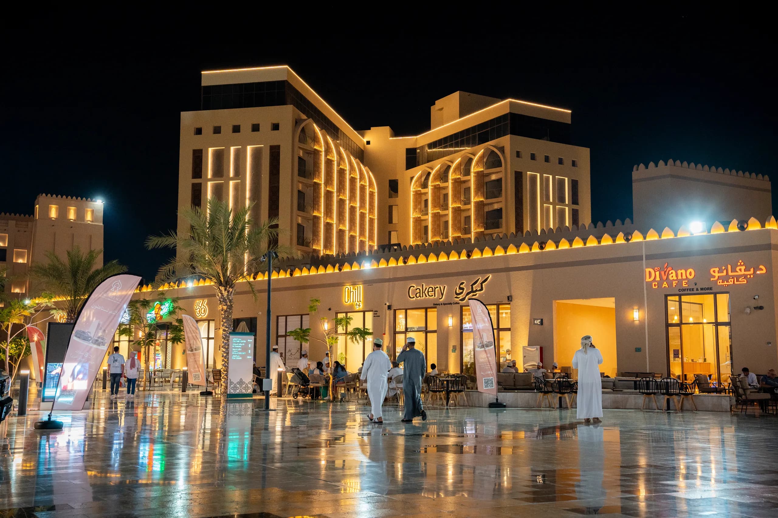 Restaurants and cafés on the Souq's plaza at night